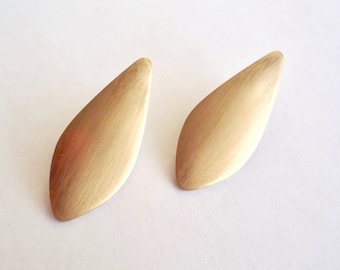Simple, sold brass, modernist earrings with brushed satin finish and stainless steel posts