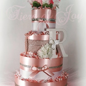 Pink diaper cake centerpiece baby flower crown pregnancy announcement ideas mommy and me dress