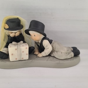 703540 &quot;Unwrapping the Layers of Love&quot; Kim Anderson Figurine