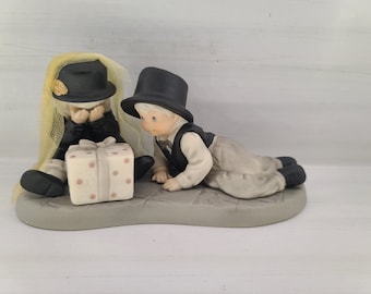 703540 "Unwrapping the Layers of Love" Kim Anderson Figurine