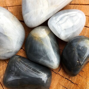 Blue Chalcedony Tumbled Stones. Blue Chalcedony Quartz Polished Gemstones. You Pick. Combined shipping for all tumbled stone purchases.