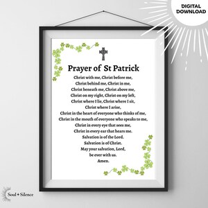 May include: A framed print of the "Prayer of St Patrick" in black text on a white background, decorated with green shamrocks and a cross. The words "DIGITAL DOWNLOAD" are in the upper right corner. The print is a digital download.