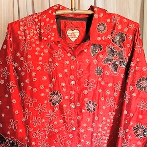 CHICOS anniversary collection 100% silk wine red putting up lined jacket embellished with beads, sequins and gold thread.  Size 2.