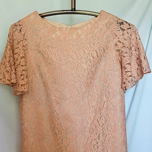 Vintage Coral lace over beige lining with sleeves in excellent condition,  size small/ med
