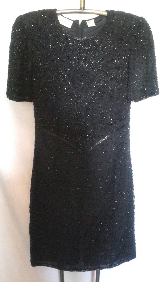 Vintage Lauren Kazar short sleeved black fitted dr