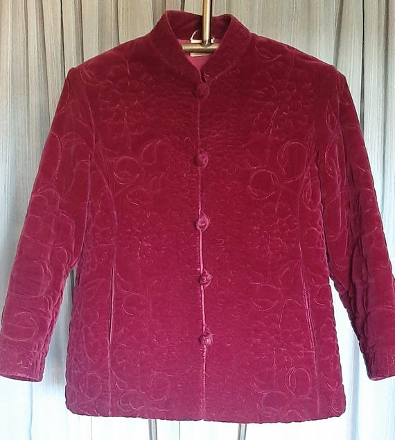 made in Hong Kong burgandy red Asian jacket, fabric quilted, frog closures, side pockets, jacket lined.  armpit to armpit is 21".