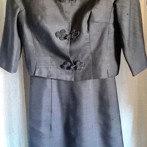 Vintage black ensemble with frog embellishments and jacket closure, both dress and jacket in excellent condition, size s/m