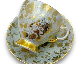 Taza y platillo de té vintage toscano color verde azulado: porcelana fina con diseño floral dorado