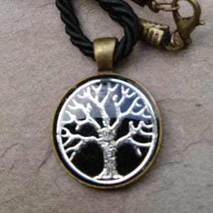 resin embedded silver plated &#39;tree of life&#39; set in bronze alloy setting
