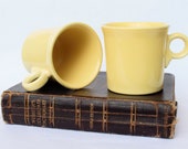 Two Yellow Fiesta Coffee Mugs, Fiestaware Light Yellow Coffee Cups - HLC Fiesta USA Tom Jerry Style Art Deco w Loop Handle Pair, Set of 2