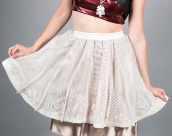 Satin skirt, high waist, with circular basque organza lined with cotton polyester