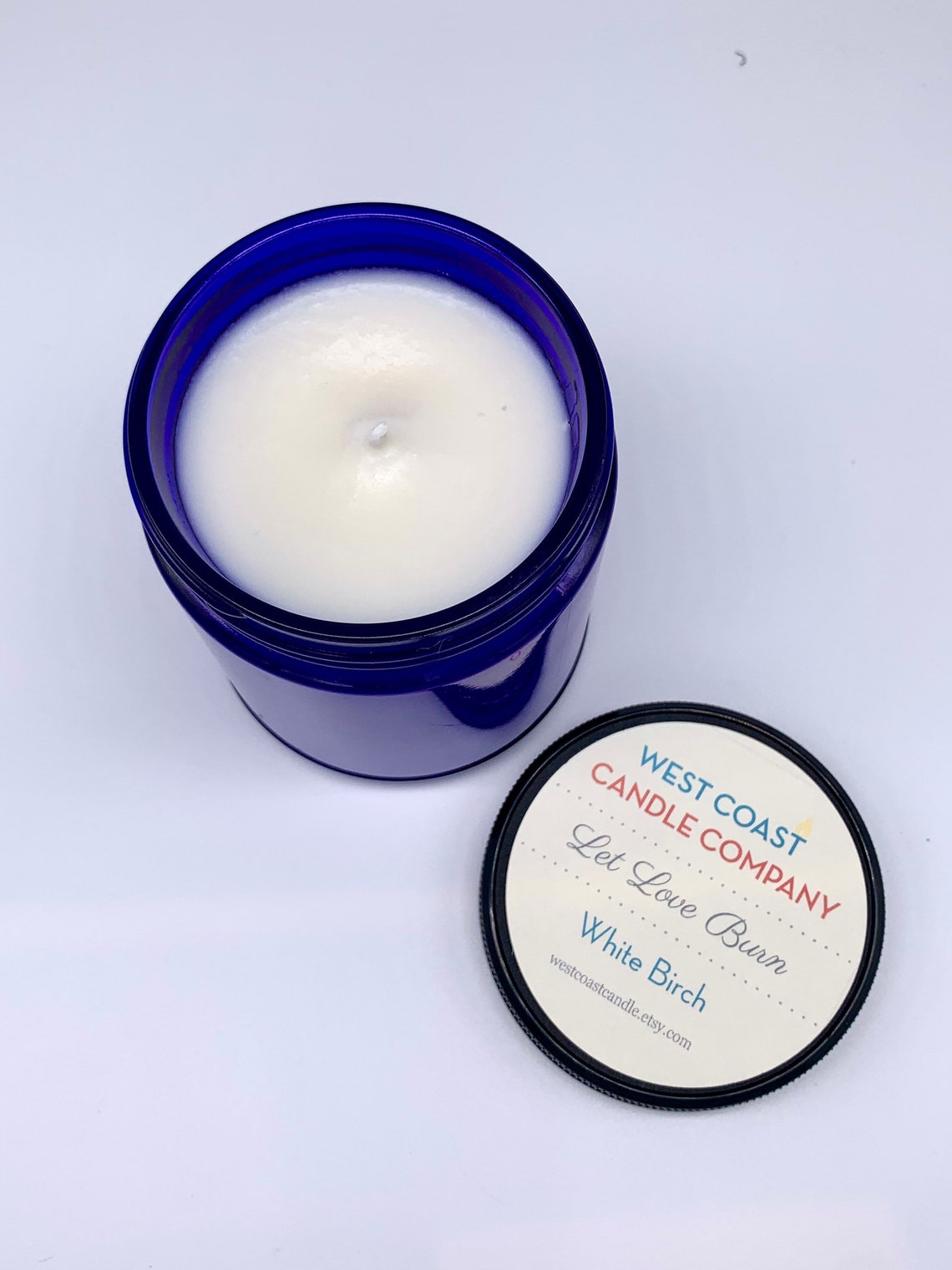 White Birch Candle in Blue Jar with Let love Burn label Etsy
