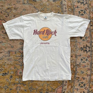 Vintage anni '90 Hard Rock Cafe Jakarta T-shirt promozionale grande oversize souvenir retro estate viaggio streetwear Hard Rock Graphic Tee