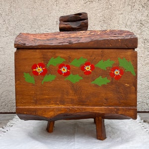 Rustic Handcrafted Wooden Chest with Unique Artisan Decoration and Vintage Charm