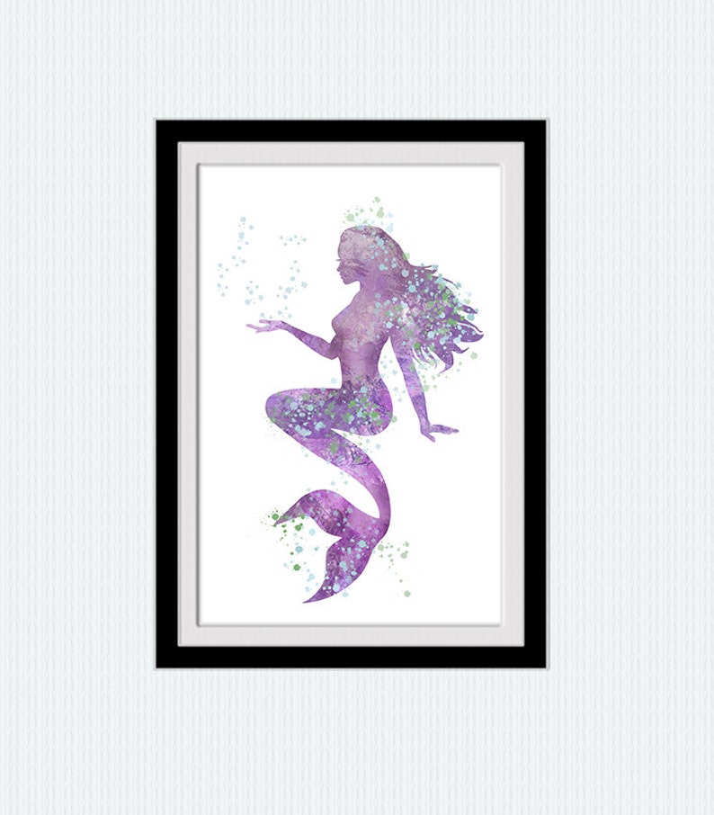 May include: Purple watercolor silhouette of a mermaid with a flowing tail and hair, surrounded by blue and green watercolor dots.
