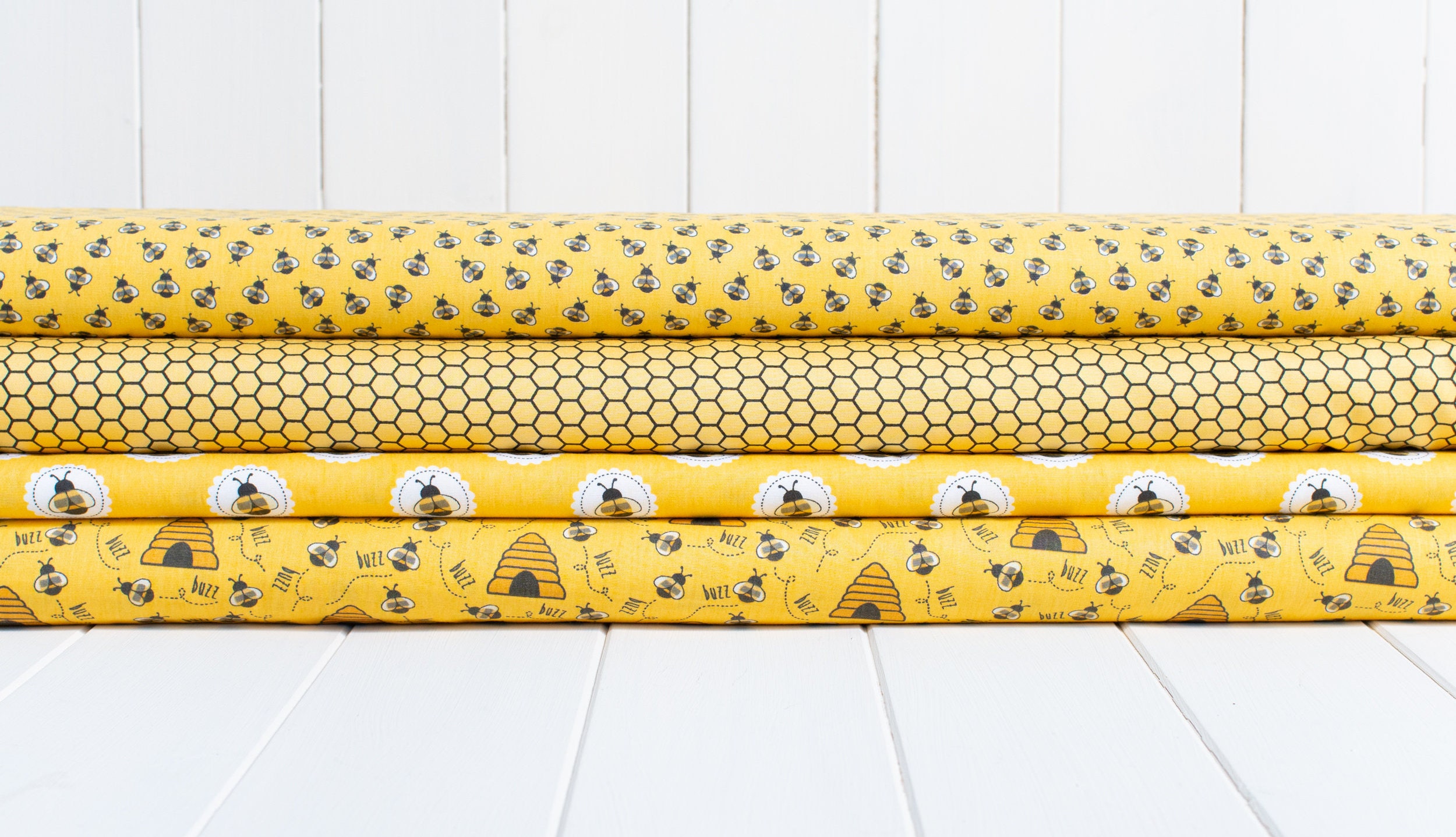 Yellow bee wide cotton fabric