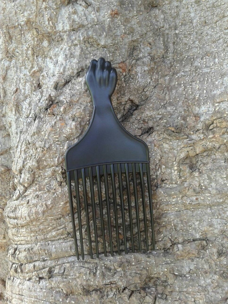 power fist afro pick Power fist afro pick