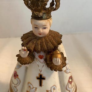 May include: A set of three ceramic nesting bowls in shades of blue, green, and white. The bowls feature a speckled glaze and a simple, modern design. The largest bowl measures approximately 6 inches in diameter.