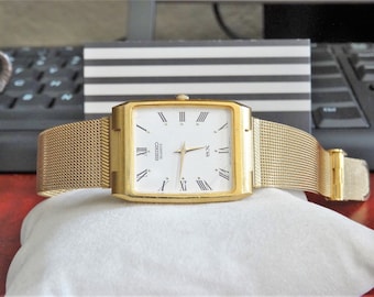 レトロ 1991 セイコー クォーツ SX ゴールド トーン ローマン ダイヤル