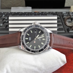 Orologio da uomo al quarzo 100M resistente all&#39;acqua Retro 1980s Timex con cinturino Hadley Roma da 18 mm