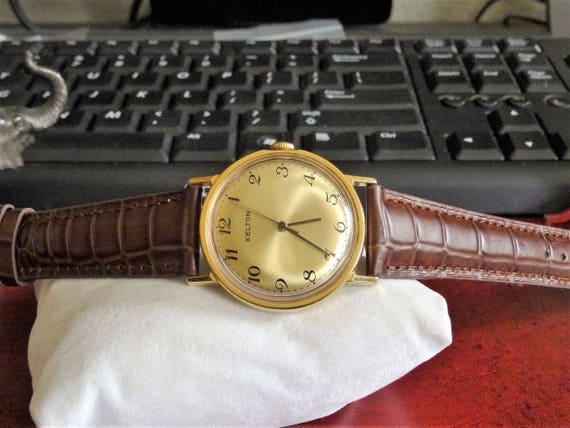 timex marlin gold