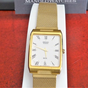 Retro 1991 Seiko Quartz SX Gold Tone Roman Dial Mens Watch w/  18mm Gold Tone Band!