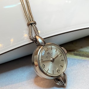Bucherer 1950s Vintage 18K Solid White Gold Wind Ladies Watch With A Metallic Rope Band