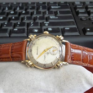 Vintage 1951 Bulova Mechanical Winding 10K Rolled Gold Plate Mens Watch w/ 16mm Hadley Roma Band!