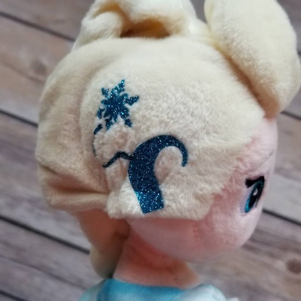 Ice Princess with cochlear implants or hearing aids plush