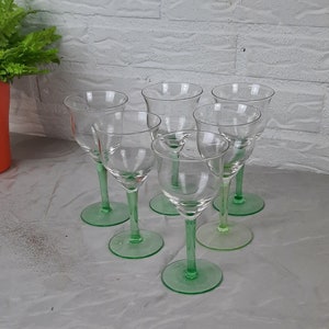 Set of 6 uranium wine glasses on green foot vintage