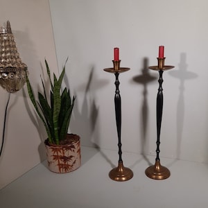 Set of two candlesticks brass/black vintage