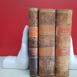 Vintage Buchstützen Keramik Hände weiß