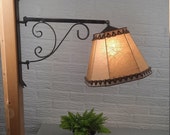 Vintage smeedijzeren leeslamp met varkensblaas kap