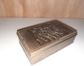 Zilverkleurige sigarettendoos uit de jaren 60