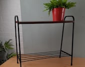 Vintage Krantentafeltje metaal / hout retro