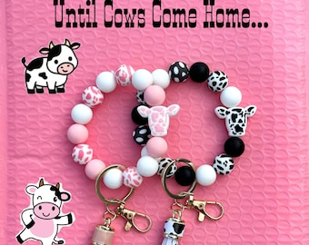 Cow Print Silicone Bead Bracelet Keychain: Pink or Black Cow print silicone wristlet keychain with tassel