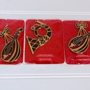 Avon 1984 Christmas ornament. Musical instruments. Set of three. Banjo ornament, Trumpet ornament