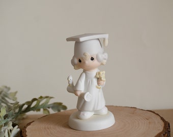 Precious Moments Graduate "The Lord bless you and keep you". Graduation girl school figurine.