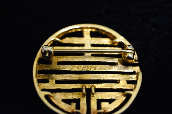 Ancient motive TBM sighed Chunky gold tone broch. - image 2