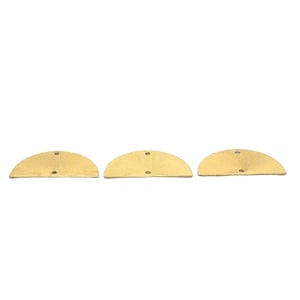 May include: Three gold-colored metal half-circle shapes with two small holes in each.