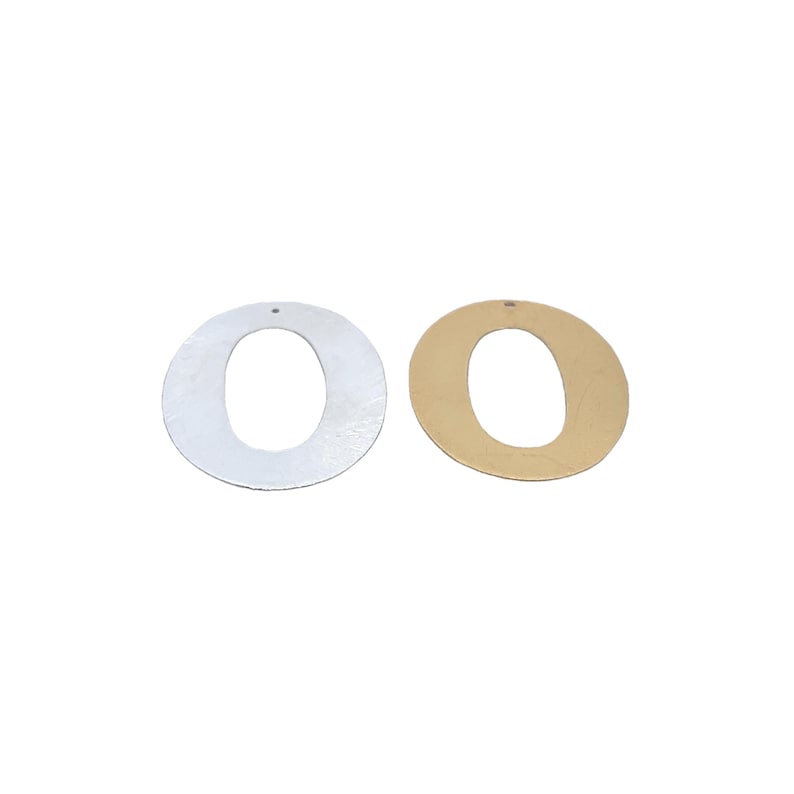 May include: Two metal letter O charms, one silver and one gold. Both charms have a hole at the top for hanging.