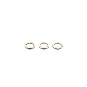 May include: Three jump rings, one gold, one silver, and one white metal.