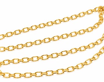 May include: A gold-toned chain necklace featuring a series of uniform, oval-shaped interlocking links. The chain is arranged in a folded, multi-layered loop, showcasing a polished, reflective metallic surface throughout the entire length of the piece.