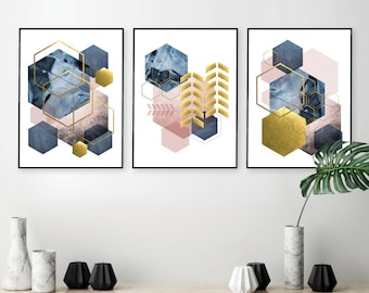 May include: Set of three abstract geometric prints featuring overlapping hexagons in shades of blue, pink, and gold. The prints have a modern and minimalist aesthetic.