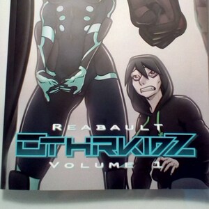 Könnte beinhalten: Ein Comic-Cover mit einer blauen und schwarzen Figur und einer grünen und schwarzen Figur im Hintergrund. Der Titel des Comics lautet "REBAULT ETHRKIDZ VOLUME 1".