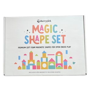 May include: A white box with the text "MAGIC SHAPE SET" in colorful letters. The box contains premium soft foam magnetic shapes for open-ended play. The box includes 456 magnetic building shapes.