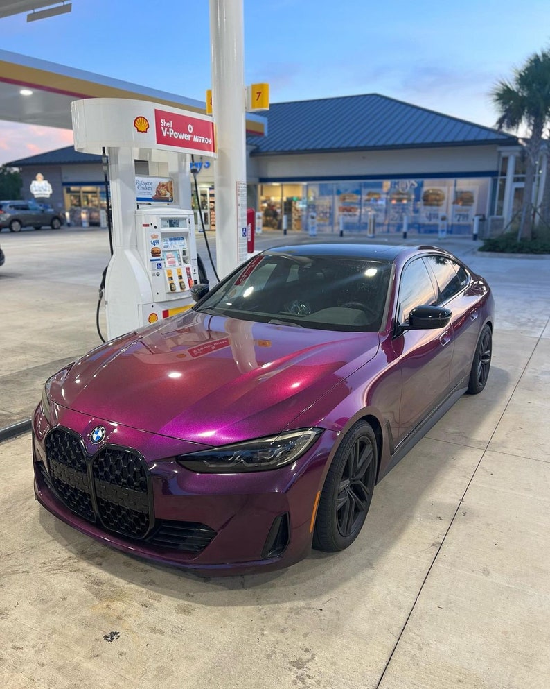 BMW in a crazy colorshift called Ceres Megashift. Such nice a nice purple to magenta mica pigment. Used in car paint liquid car wrap