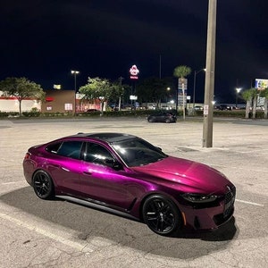 BMW in a crazy colorshift called Ceres Megashift. Such nice a nice purple to magenta mica pigment. Used in car paint liquid car wrap