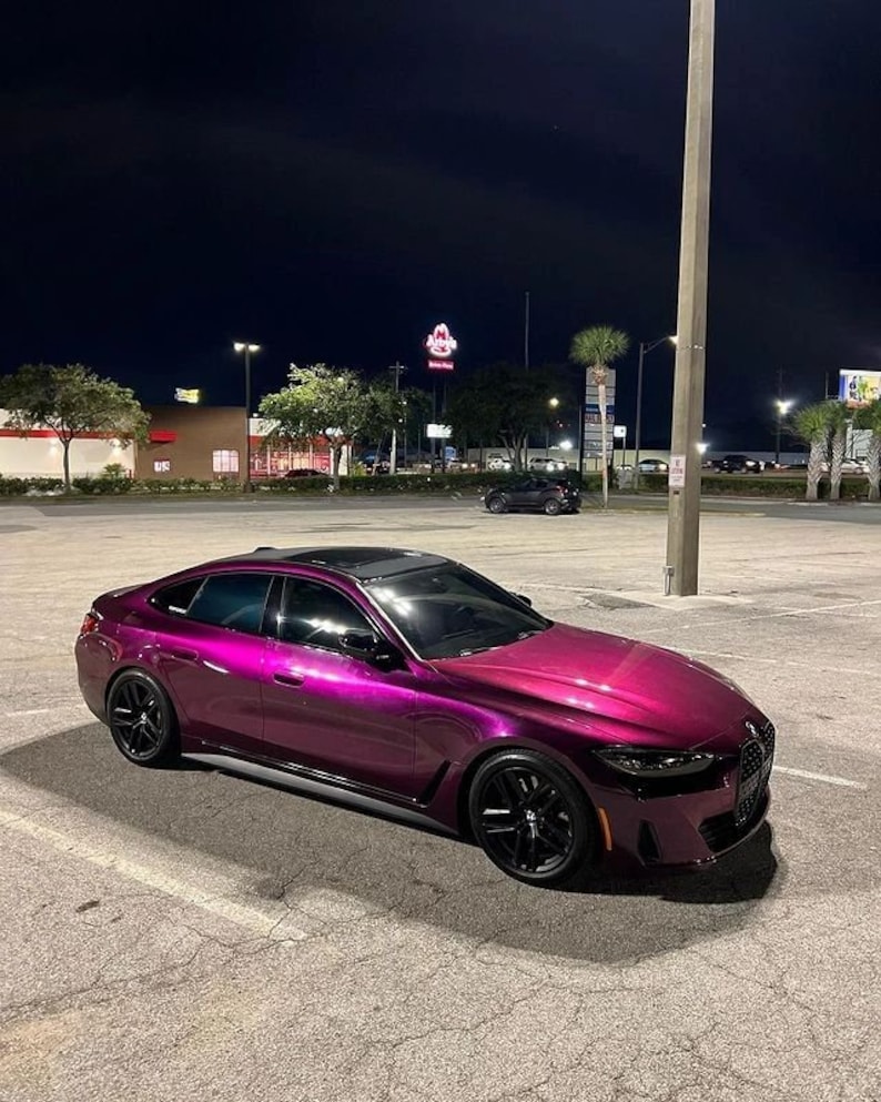 BMW in a crazy colorshift called Ceres Megashift. Such nice a nice purple to magenta mica pigment. Used in car paint liquid car wrap