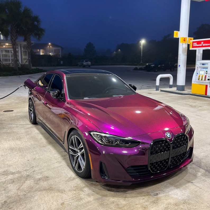 BMW in a crazy colorshift called Ceres Megashift. Such nice a nice purple to magenta mica pigment. Used in car paint liquid car wrap